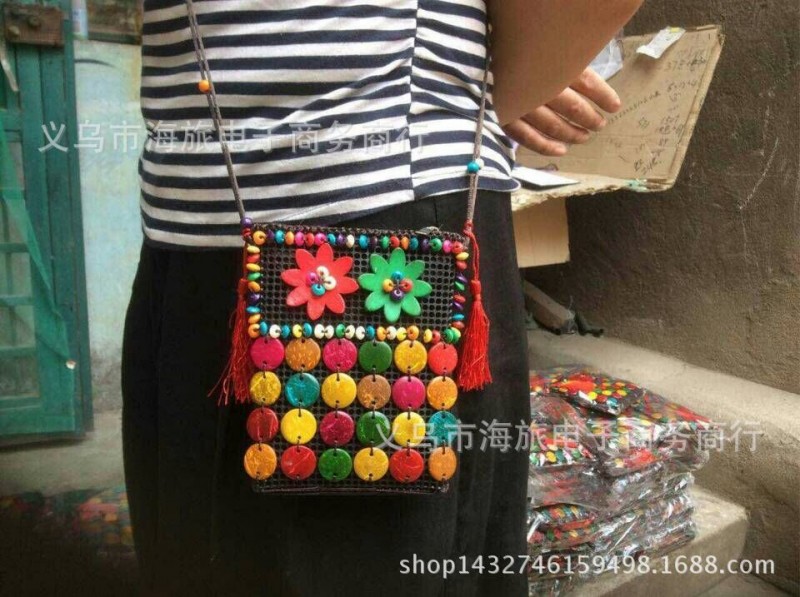 海南民族特色中國結椰殼手機包 特色花朵椰殼女包 純手工串珠包工廠,批發,進口,代購